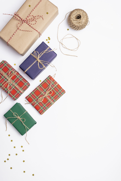colorful christmas presents with golden stars string